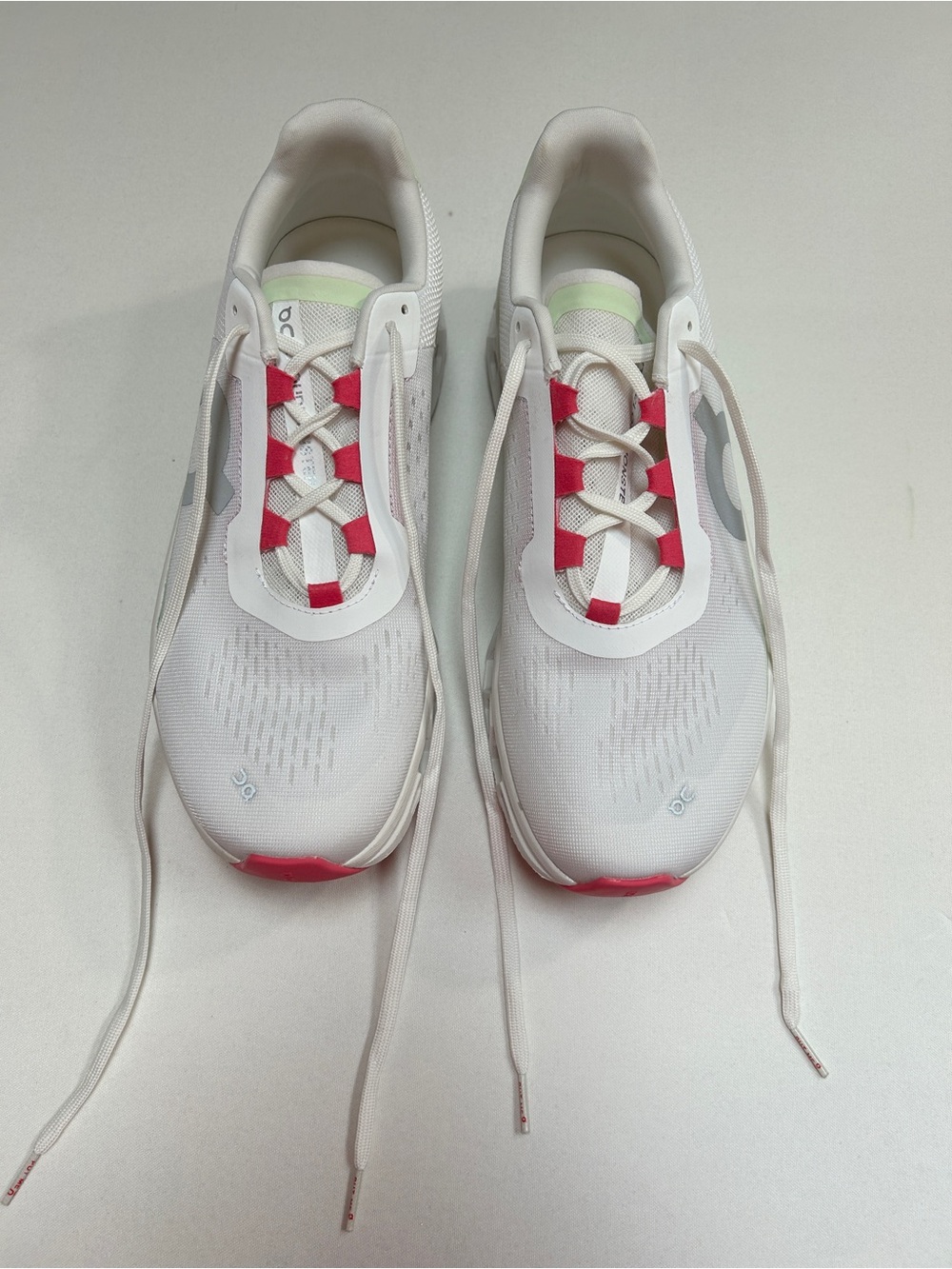 On Running Women's White Sneakers with Pink Accents
